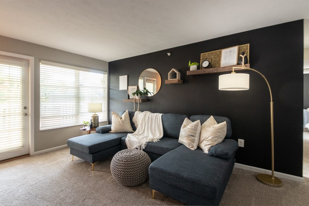 This is a photo of the living room in the 1226 square foot 3 bedroom, 2 bath Hambletonian at Trails of Saddlebrook Apartments in Florence, KY.