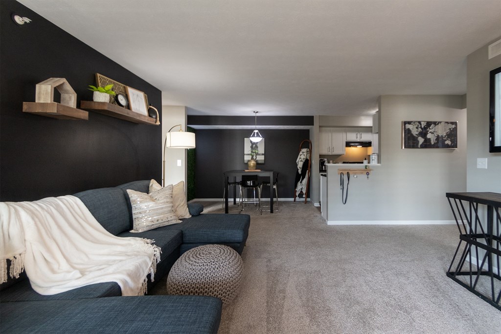 This is a photo of the dining room from the living room in the 1226 square foot 3 bedroom, 2 bath Hambletonian at Trails of Saddlebrook Apartments in Florence, KY.