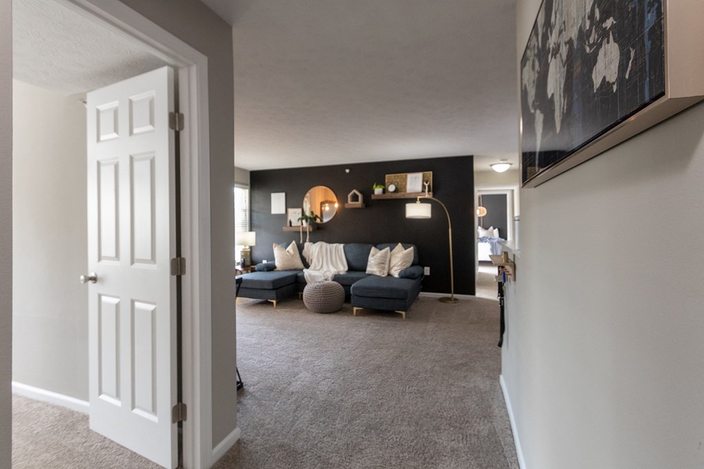 This is a photo of the living room in the 1226 square foot 3 bedroom, 2 bath Hambletonian at Trails of Saddlebrook Apartments in Florence, KY.