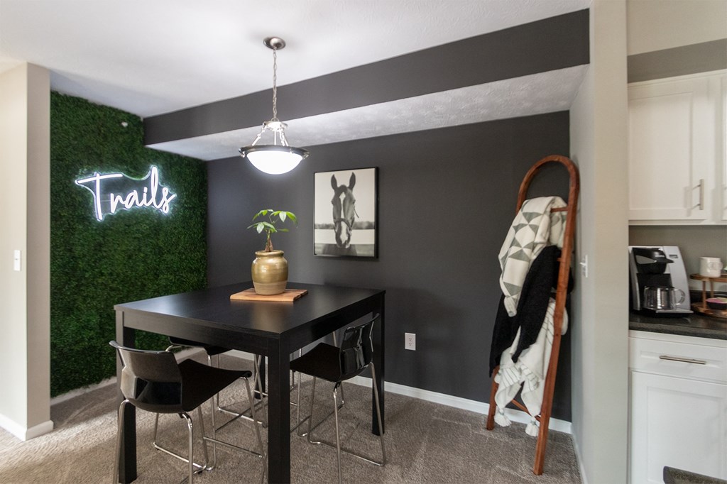 This is a photo of the dining room in the 1226 square foot 3 bedroom, 2 bath Hambletonian at Trails of Saddlebrook Apartments in Florence, KY.