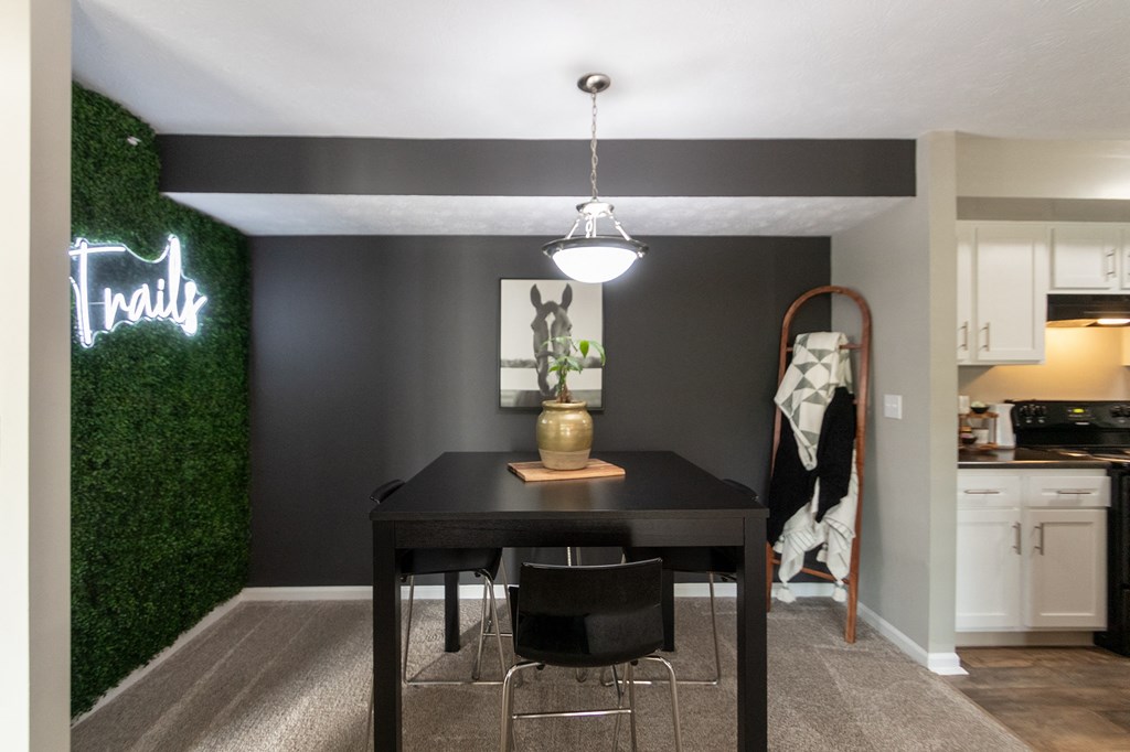 This is a photo of the dining room in the 1226 square foot 3 bedroom, 2 bath Hambletonian at Trails of Saddlebrook Apartments in Florence, KY.