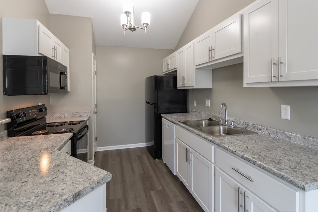 This is photo of the kitchen in the 852 square foot, 1 bedroom, 1 bath Fairlawn floor plan at Trails of Saddlebrook Apartments in Florence, KY.
