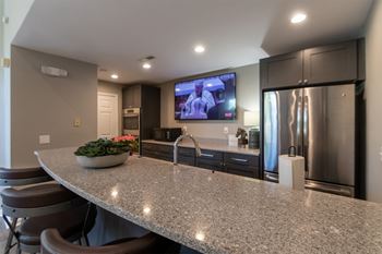 This is a photo of the kitchen in the resident clubhouse at Trails of Saddlebrook Apartments in Florence, KY.