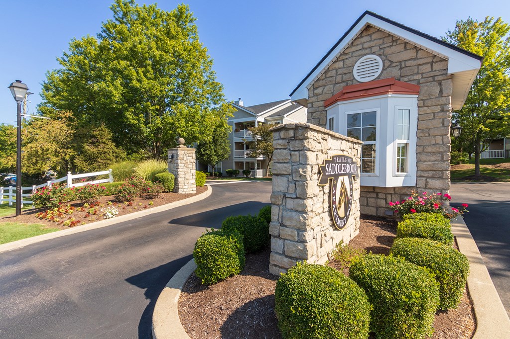 This is a photo of the entrance sign of Saddlebrook Apartments in Florence, KY.