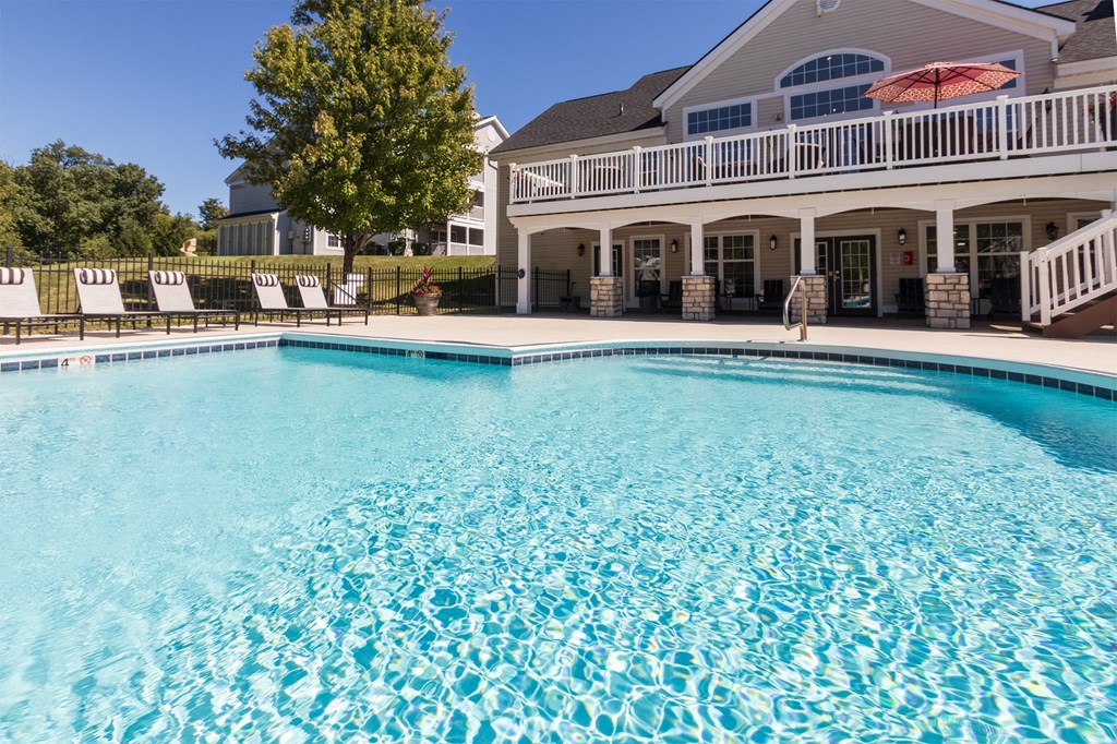 This is a photo of the pool area at Trails of Saddlebrook Apartments in Florence, KY.