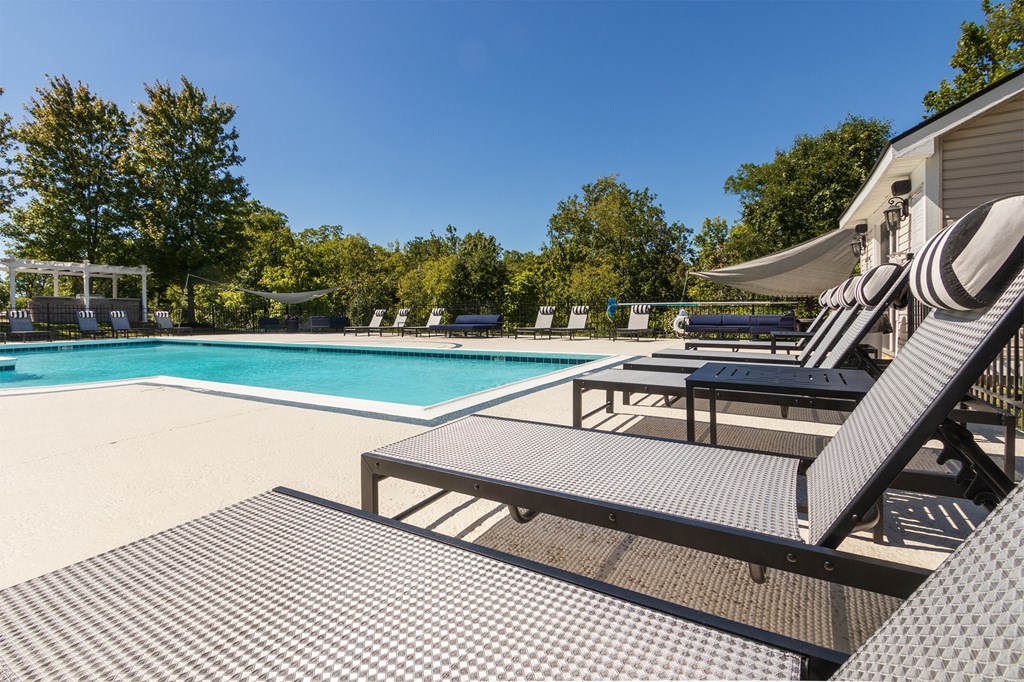 This is a photo of the pool area at Trails of Saddlebrook Apartments in Florence, KY.