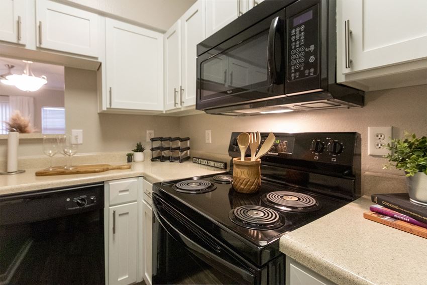 This is a photo of the kitchen in the 1135 square foot 2 bedroom Retreat floor plan at The Sanctuary at Fishers Apartments in Fishers, IN. - Photo Gallery 1