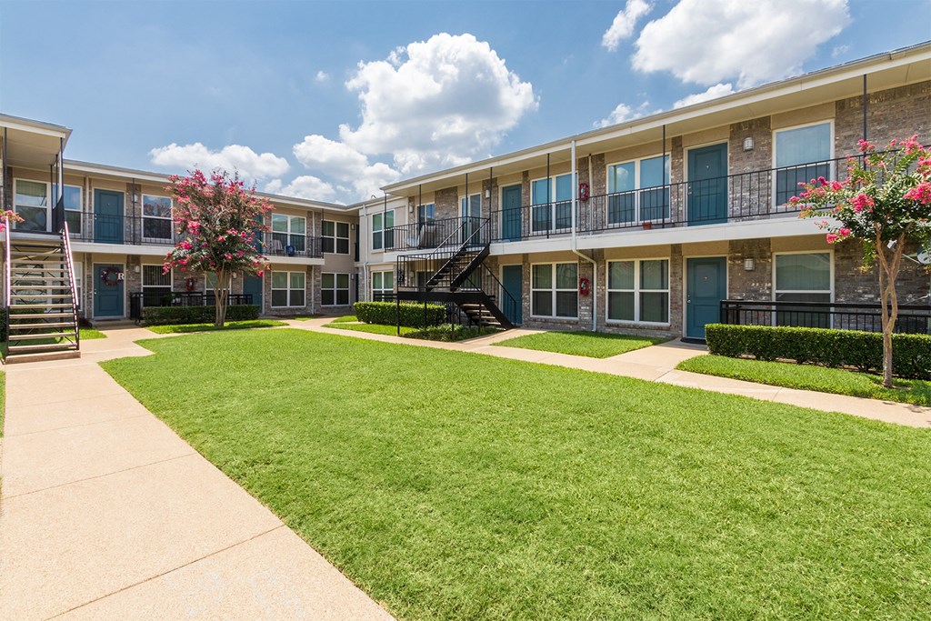 This is a photo of a building exterior at The Summit at Midtown in Dallas, TX.