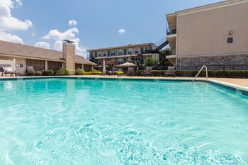 This is a photo of the pool area at The Summit at Midtown Apartments in Dallas, TX. - Photo Gallery 2