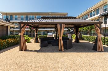 This is a photo of the pool area at The Summit at Midtown Apartments in Dallas, TX.