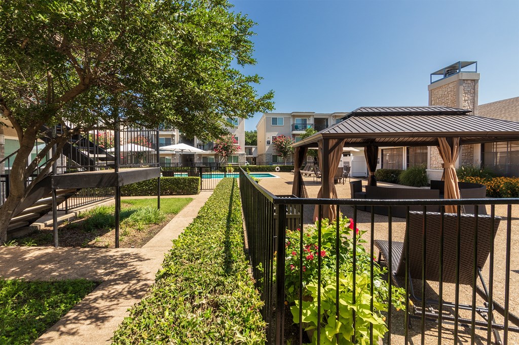 This is a photo of the pool area at The Summit at Midtown Apartments in Dallas, TX.