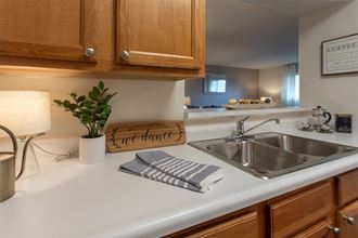 This is a photo of the kitchen in the 822 square foot, 2 bedroom, 1 bath floor plan at Village East Apartments in Franklin, OH.