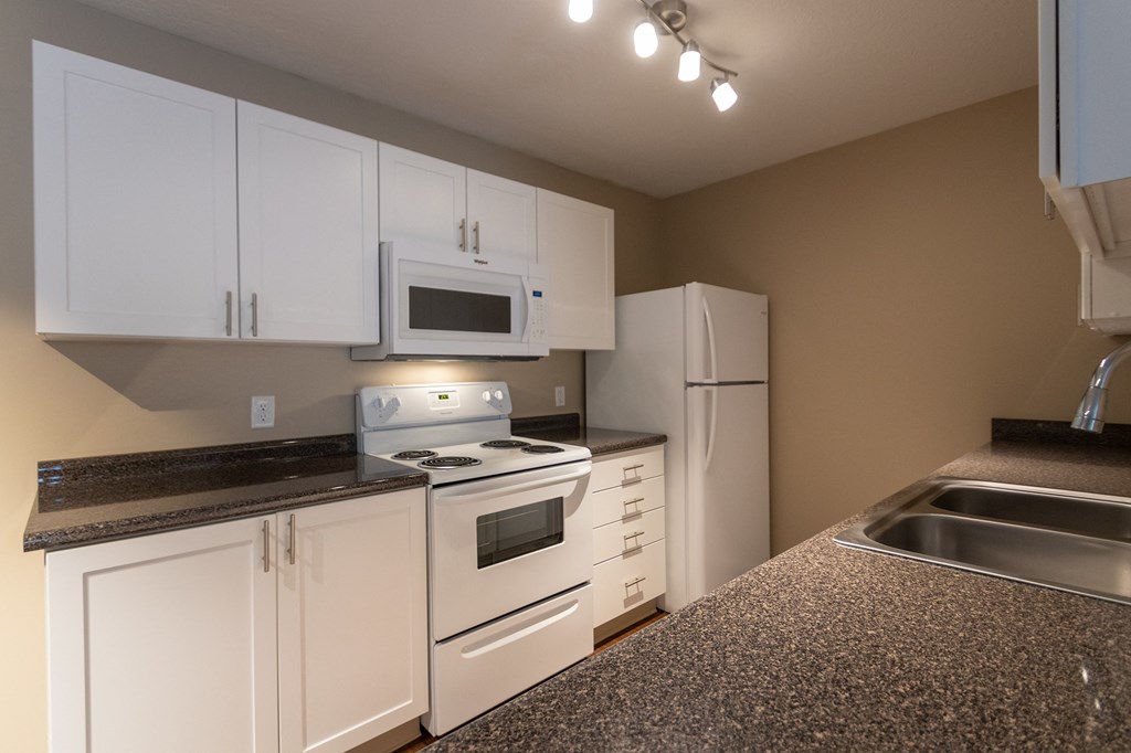 This is a photo of the kitchen in the 1170 square foot 2 bedroom, 2 bath Freedom Balcony at Washington Place Apartments in Miamisburg, Ohio in Washington Township.