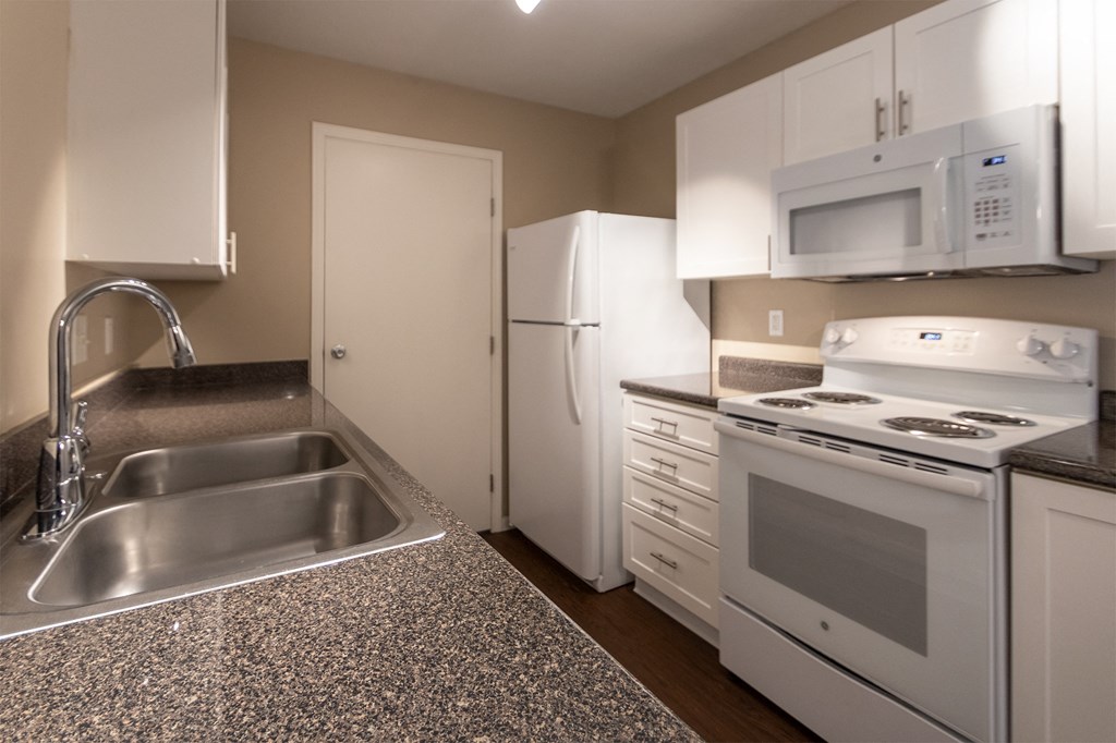 This is a photo of the entryway and stairs to to the second floor in the 1040 square foot 2 bedroom, 1 bath Patriot at Washington Place Apartments in Miamisburg, Ohio in Washington Township.