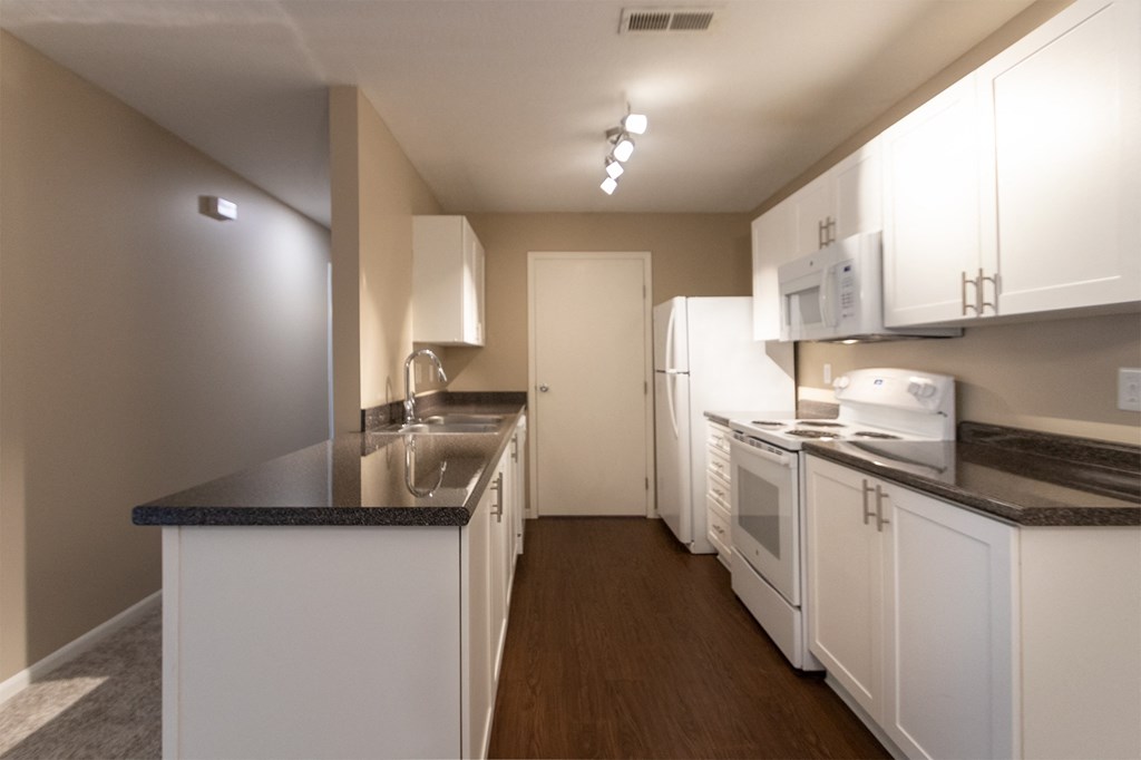 This is a photo of the kitchen in the 1040 square foot 2 bedroom, 1 bath Patriot at Washington Place Apartments in Miamisburg, Ohio in Washington Township.