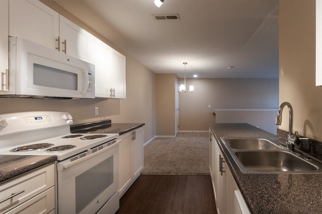This is a photo of the kitchen in the 1040 square foot 2 bedroom, 1 bath Patriot at Washington Place Apartments in Miamisburg, Ohio in Washington Township.