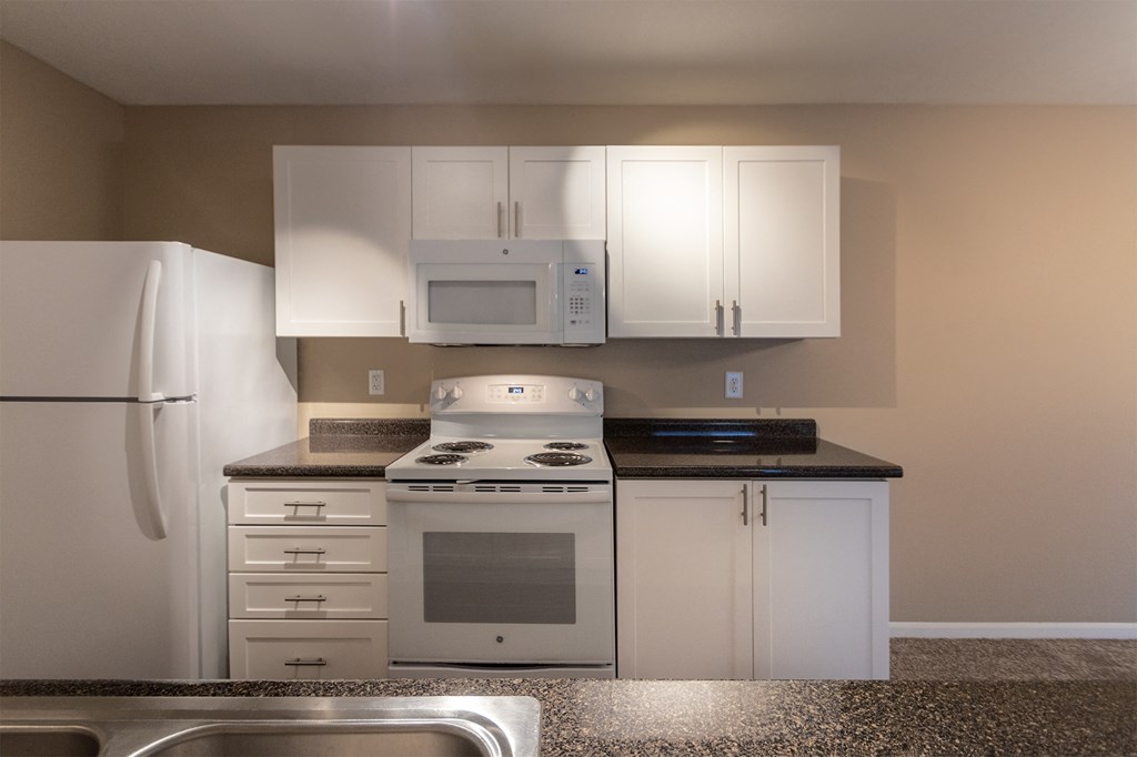 This is a photo of the kitchen in the 1040 square foot 2 bedroom, 1 bath Patriot at Washington Place Apartments in Miamisburg, Ohio in Washington Township.