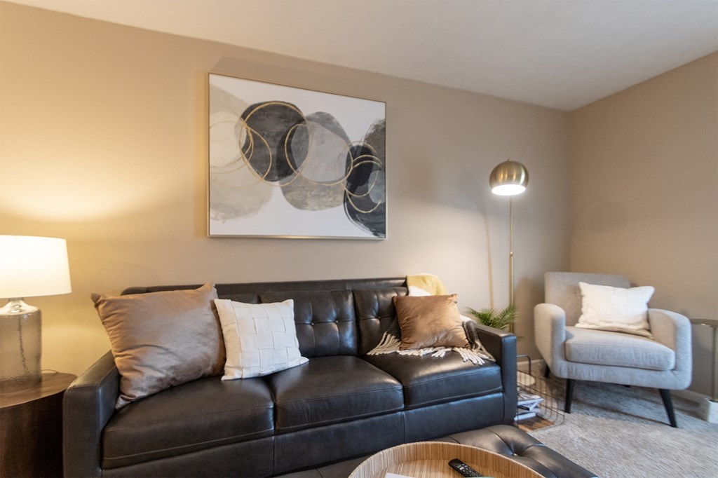 This is a photo of the living room of the 890 square foot 2 bedroom, 2 bath Liberty at Washington Place Apartments in in Miamisburg, Ohio in Washington Township.