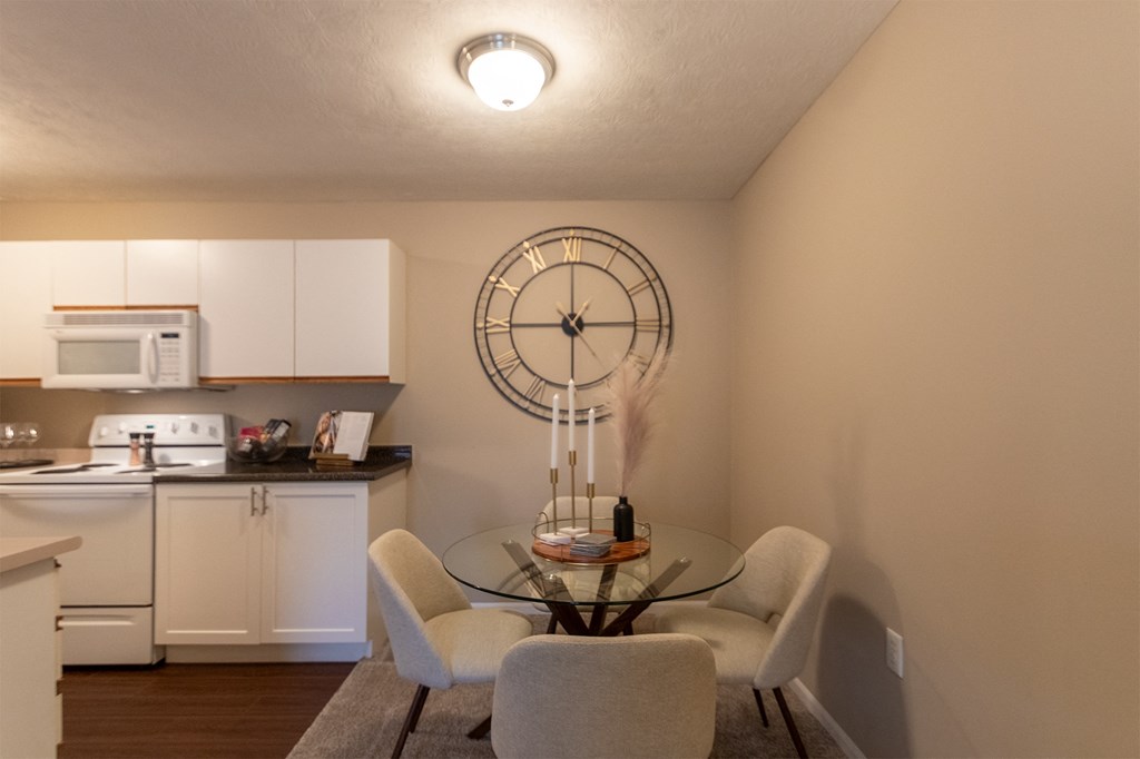This is a photo of the dining room of the 890 square foot 2 bedroom, 2 bath Liberty at Washington Place Apartments in in Miamisburg, Ohio in Washington Township.