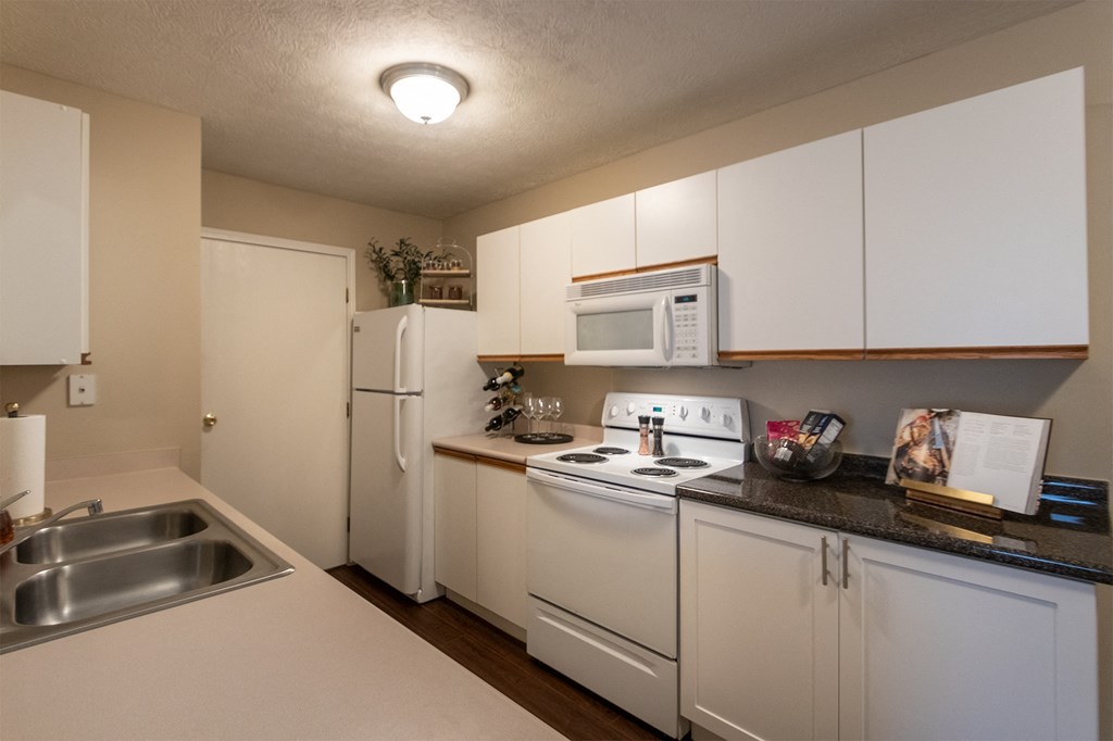 This is a photo of the living room of the 890 square foot 2 bedroom, 2 bath Liberty at Washington Place Apartments in in Miamisburg, Ohio in Washington Township.
