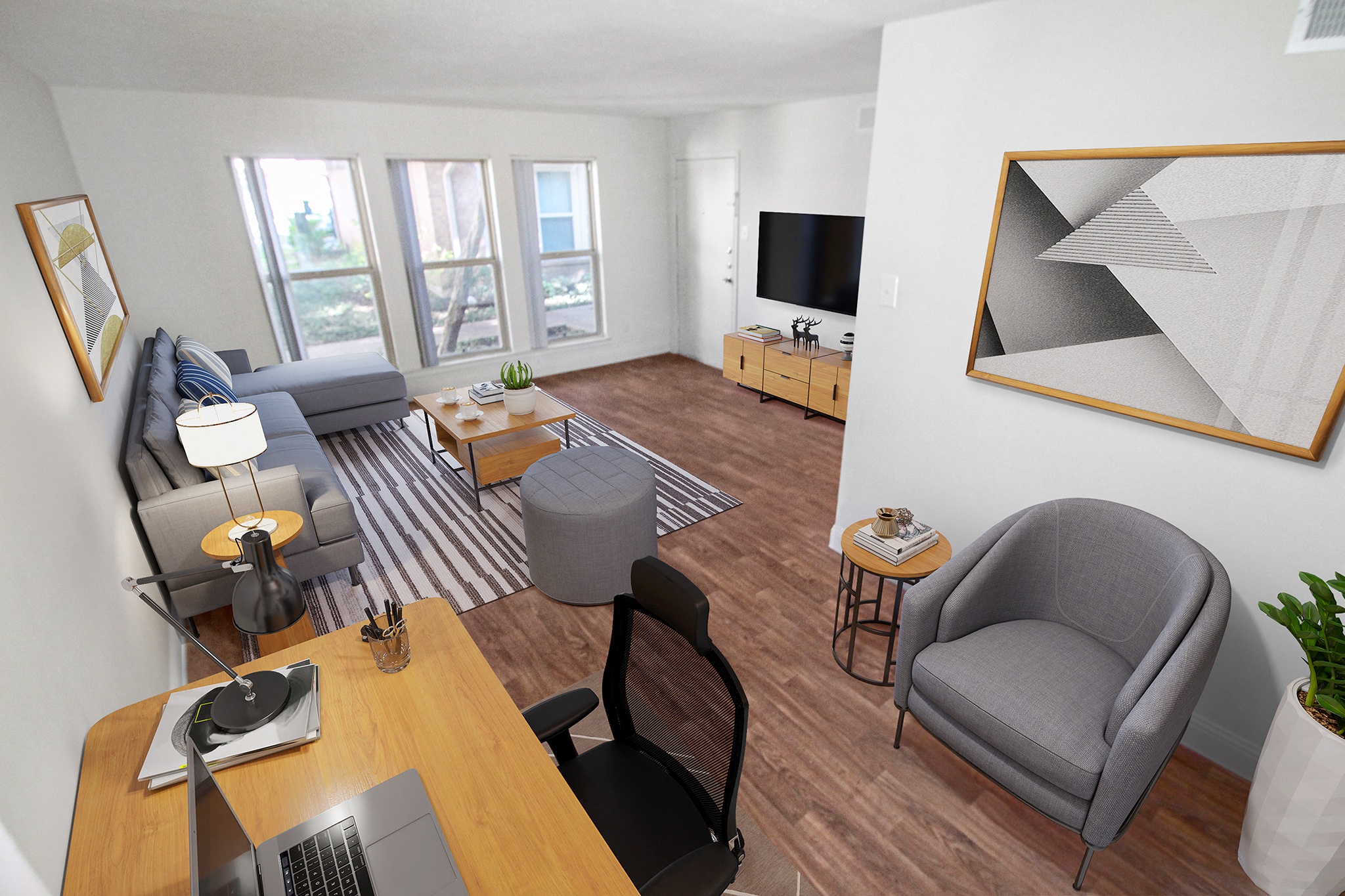 This is a photo of a virtually staged living room in the 751 square foot 1 bedroom, 1 bath apartment at Woodbridge Apartments in Dallas, TX.