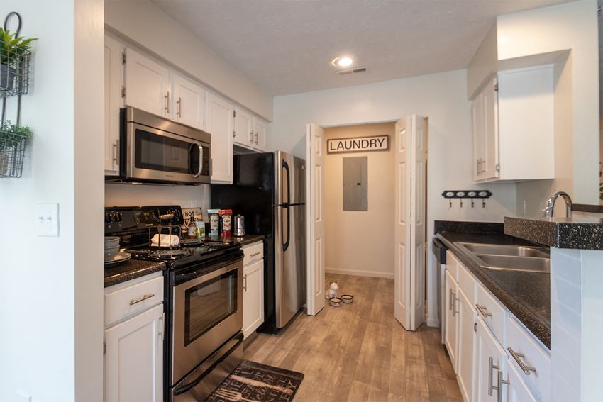 This is a photo of the kitchen of the 1100 square foot 2 bedroom Kettering floor plan at Washington Park Apartments in Centerville, OH. - Photo Gallery