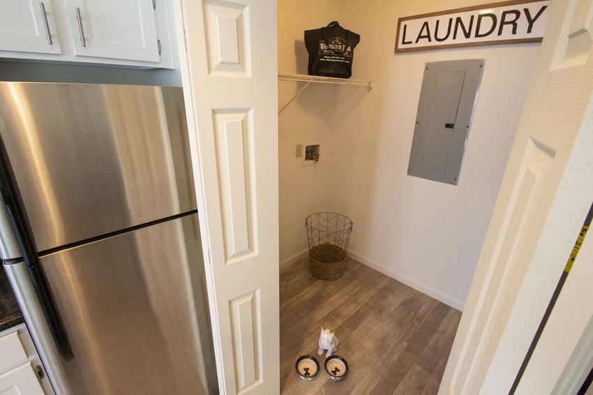 This is a photo of the laundry closet with washer and dryer connections of the 1100 square foot 2 bedroom Kettering floor plan at Washington Park Apartments in Centerville, OH. - Photo Gallery