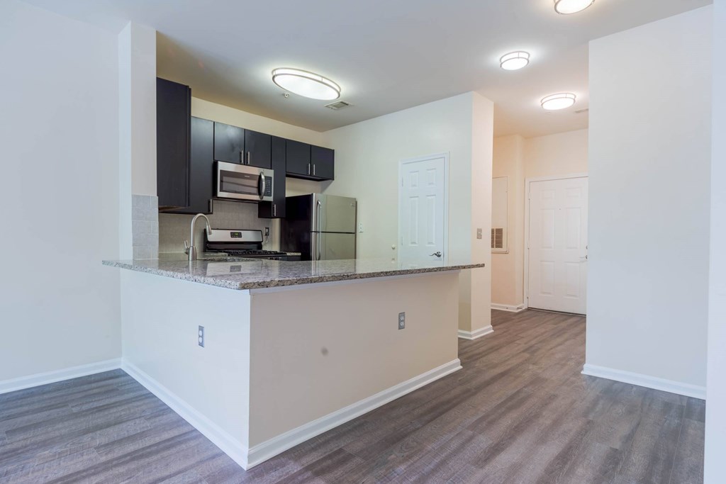 A kitchen area with a counter and cabinets.at Riverview Landing @ Valley Forge, Eagleville, 19403