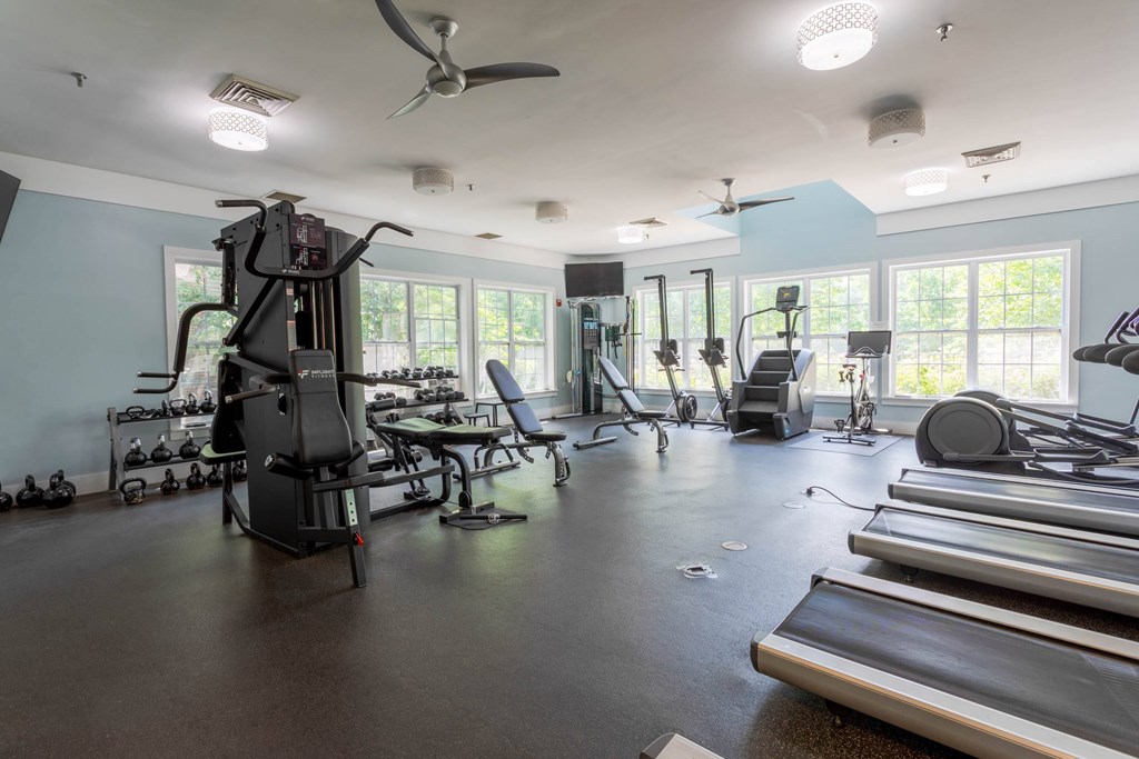 A spacious gym with treadmills, elliptical machines, and other exercise equipment.at Riverview Landing @ Valley Forge, Eagleville, PA