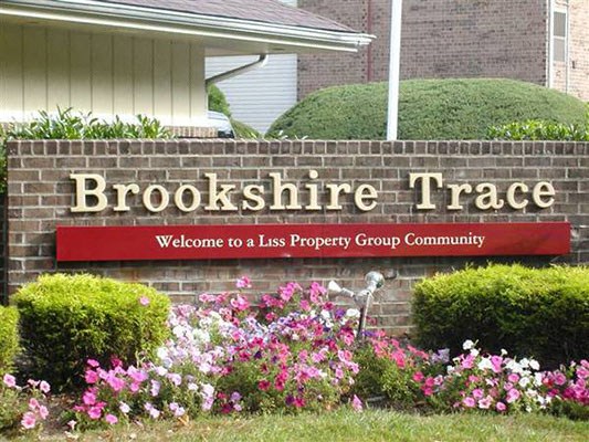 a sign for brookshire trace in front of a brick wall a sign for brookshire trace in front of a brick wall at Brookshire Trace Townhomes Apartments, Philadelphia, PA