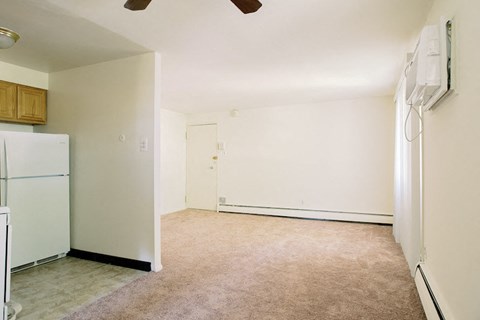 a kitchen with a white refrigerator and a white door a kitchen with a white refrigerator and a white door at Krewstown Park Apartments, Philadelphia, PA