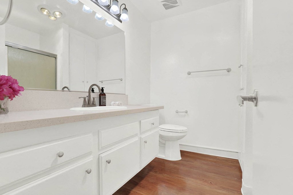 a bathroom with a sink and a toilet in it at Camino de Oro Apartments, Torrance, CA, 90505