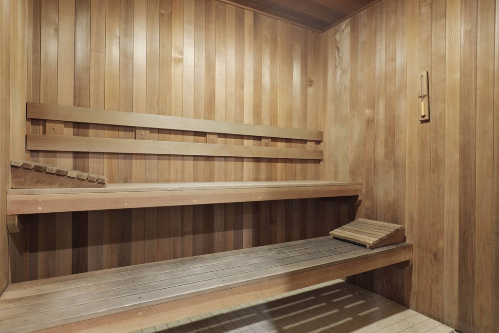 a sauna with wooden benches and wooden walls at Willow Tree Apartments, California, 90505