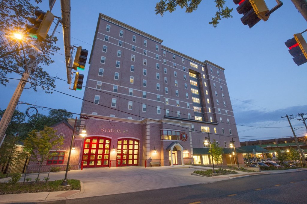 a tall building with a street in front of it