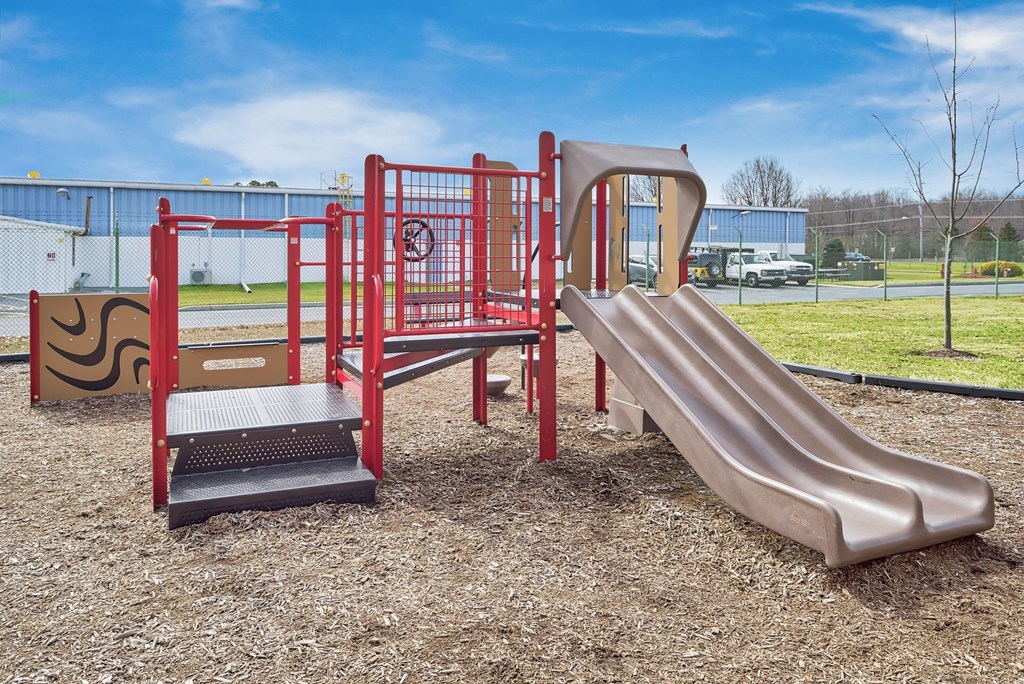 a playground with a slide and other play equipment