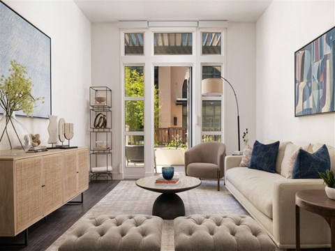 a living room with a couch and a table