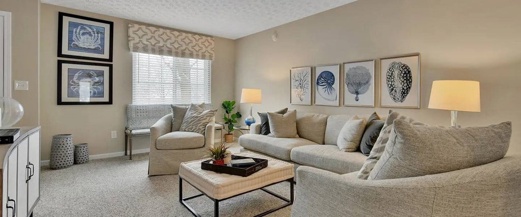 a living room with a couch and a table
