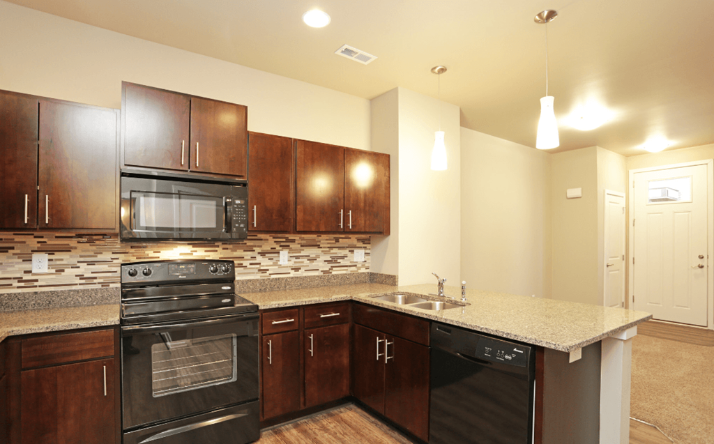 Elegant And Timeless Kitchen at 7th Street Brownstones, Indigo Living, IA