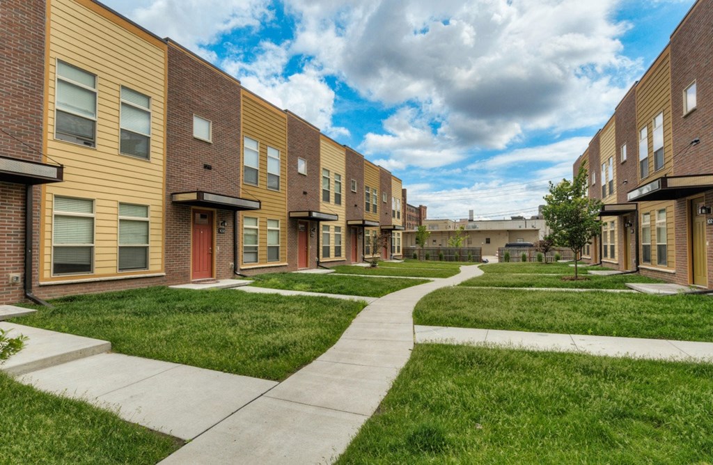 Community Exterior and Green Walkways Community Exterior and Green Walkways at 7th Street Brownstones, Indigo Living, IA, 50309