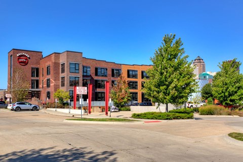 A large red brick building with a sign that says "Ballroom".