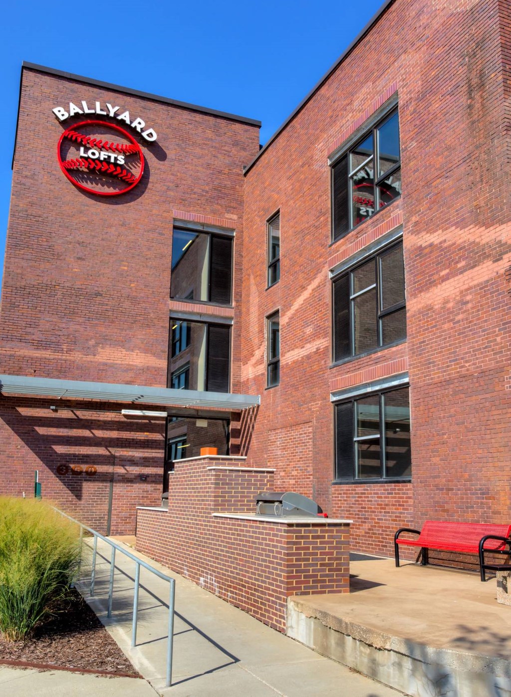 Community exterior with signage at Ballyard Lofts, Iowa , 50309