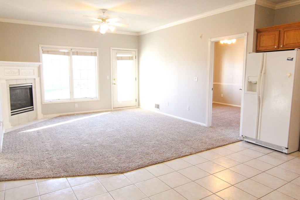an empty living room with a refrigerator at Diamond Brooke, Iowa, 50266 
