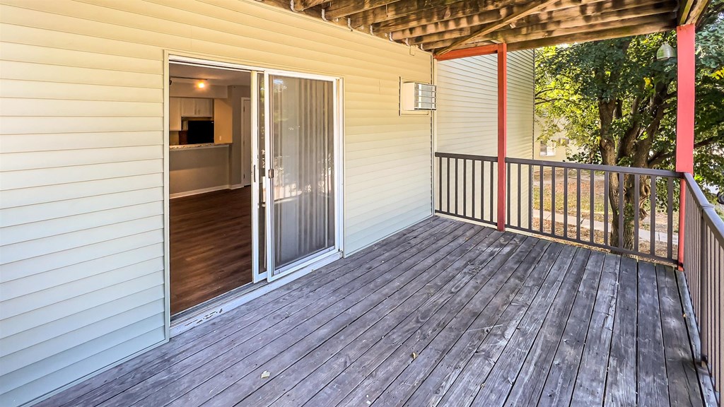 the deck of a home with a sliding glass door at Rosemont Place Apartments, Des Moines, 50320