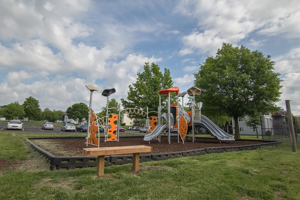 a playground in a park on a cloudy day at Somerset Apartments, Des Moines, 50315