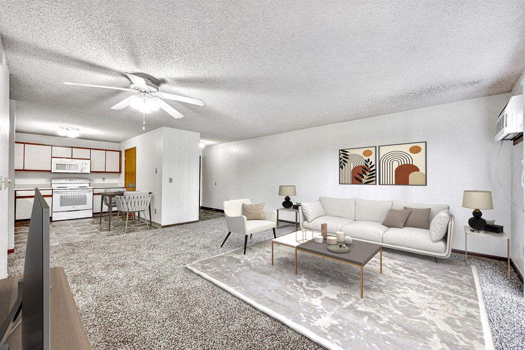 a living room with a couch and a table at Somerset Apartments, Iowa, 50315