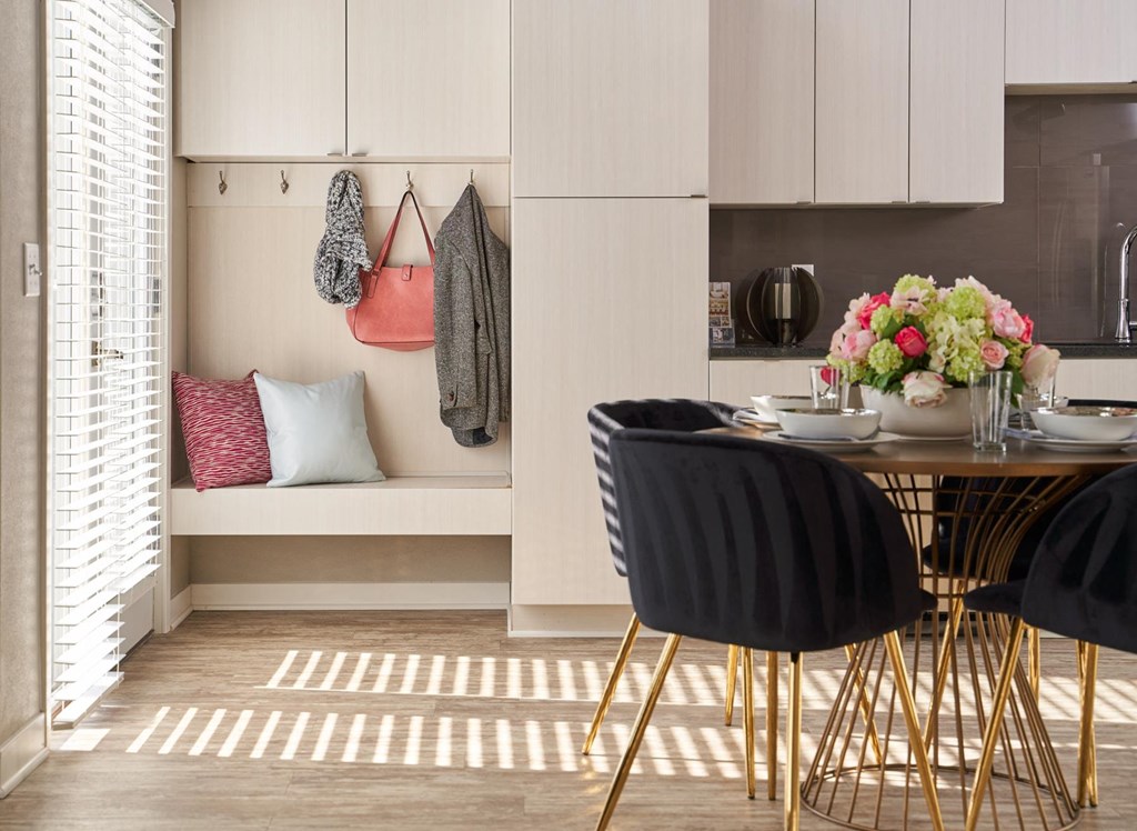 a dining room with a table and chairs a dining room with a table and chairs at Velocity Apartments, Des Moines, IA