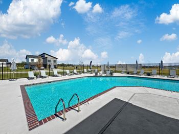 the pool at the estates apartments at Rialto Townhomes Apartments, Iowa, 50263