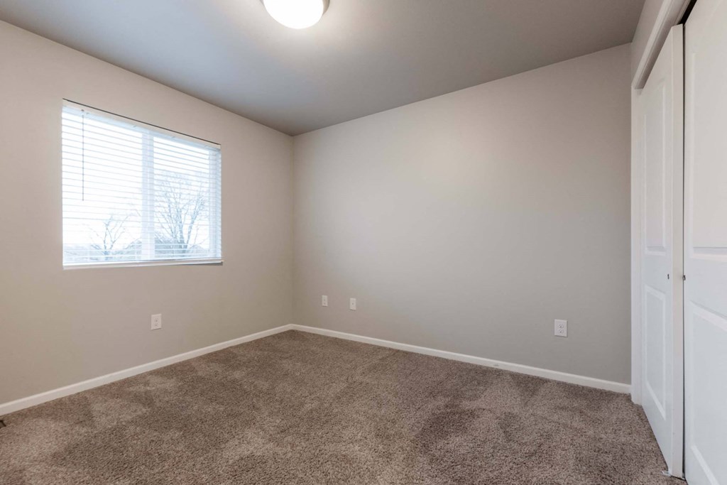 Carpeted Bedroom at Danamere Village, Carlisle, IA