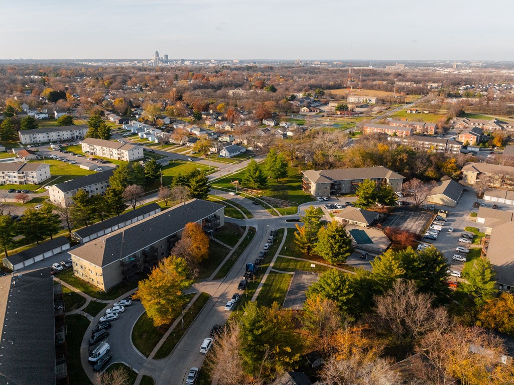 A view of a residential area with houses and trees at Rosemont Place Apartments, Iowa