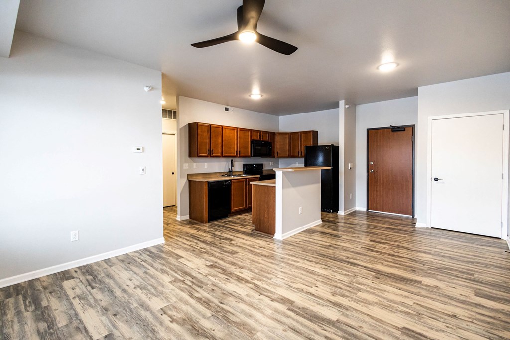 Living rom along with ceiling fan at Meadowlark Place Apartments, Grimes